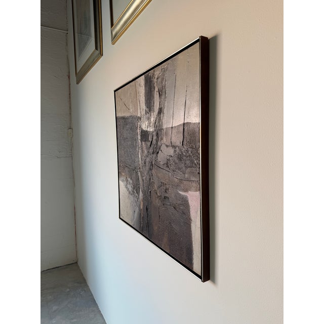 Striking 1970s vintage mixed media abstract painting, executed in rich earth tones and layered textures on Masonite board....