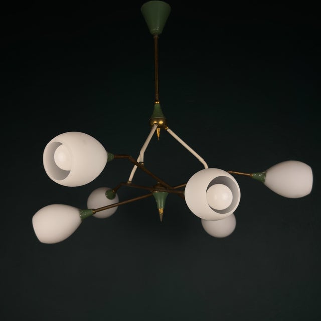 Beautiful vintage chandelier by stilnovo made in italy in the 1960s. stilnovo manufacture from italy, founded in 1946, is...