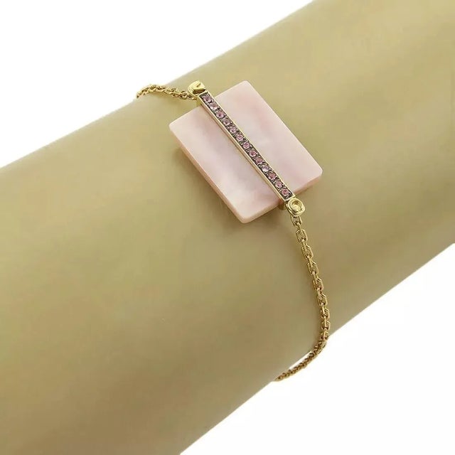 Material: 18k yellow gold Hallmark: Victoria Casal 750 Measurement: 7" long Center charm: 28.5mm long x 15mm wide...