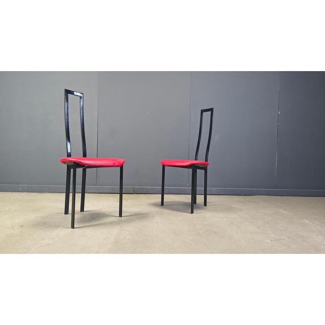 Italian metal postmodern dining chair by Cattelan Italia with red leatehrette seats. Good condition Design by Maurizio...