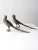 A handsome pair of vintage tabletop pheasant figurines crafted in metal with exceptional detailing throughout. The...