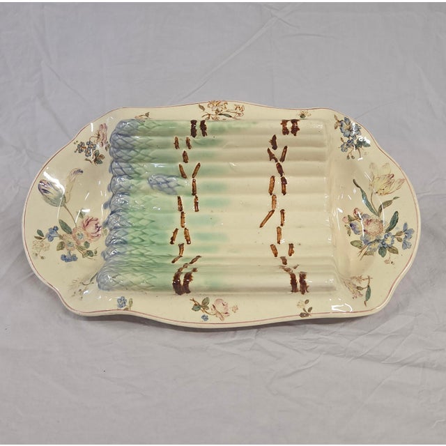 A beautiful and functional antique circa 1900 French Longchamp majolica asparagus serving platter. The cradle, ornamented...