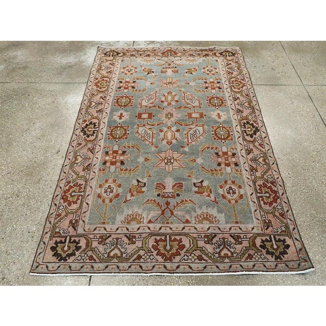 A vintage Persian Malayer accent rug handmade during the Mid-20th century. Measures: 4' 4" x 6' 9"