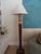 A Striking walnut and gilt-wood Neoclassical floor lamp of good size circa 2011 Paul Ferrante is a source to the trade for...