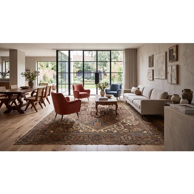 A striking example of late 19th-century craftsmanship, this Antique Serapi Heriz Wool Rug showcases a bold, architectural...