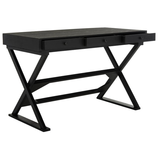 Make efficient use of space with the compact silhouette of the desk by .Crafted of firewood with a clean contemporary...
