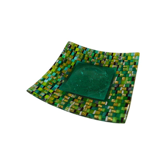 - Decorative plate in Murano glass - Central decoration in transparent green glass - Silver leaf and multicolored side...