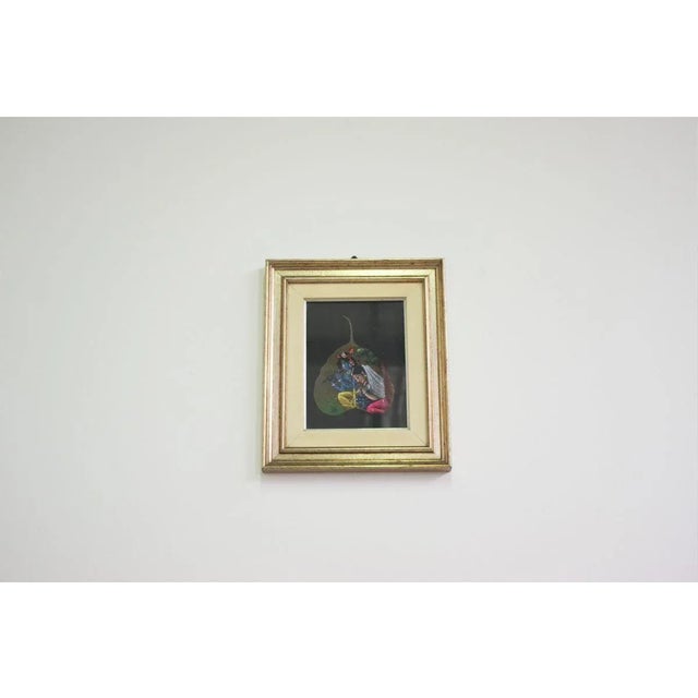 Indian panels with painted leaf with wooden frame, 1970s.