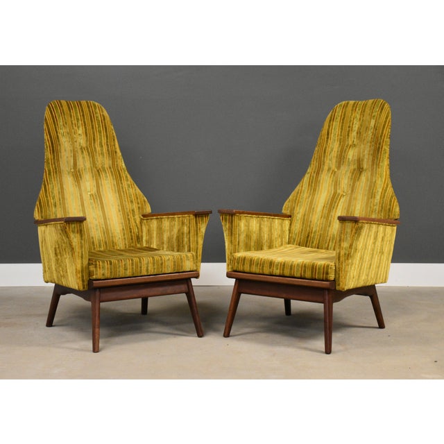 A pair of mid century modern original yellow fabric tall back lounge chairs designed by Adrian Pearsall for Craft...
