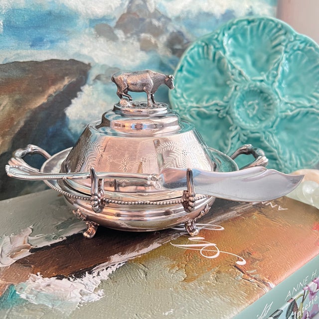 Enhance your dining table with a touch of Victorian elegance with this Antique Quadruple Silverplate Butter Cooler by...