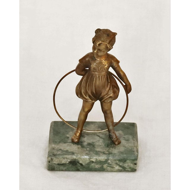 Art Nouveau – Art Deco Bronze Figurine Bronze figurine produced 1915/25. Girl with hula hoop. Intricately chased....