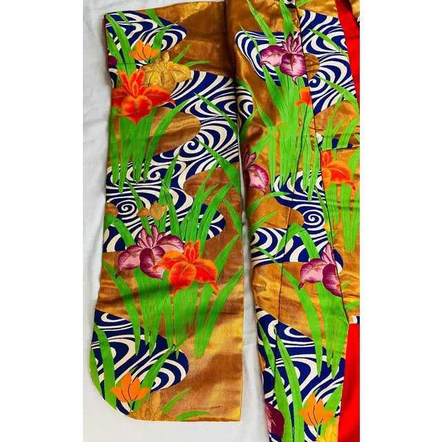 An early 20th century exceptional Embroidered Japanese Ceremonial Kimono featuring marvelous handmade floral pattern in...