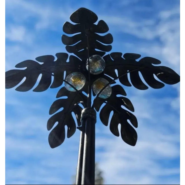 Palm tree floor lamp with crystal coconut lights. Made with aluminum for outdoor patio, porch, lanai or pool area. Can be...