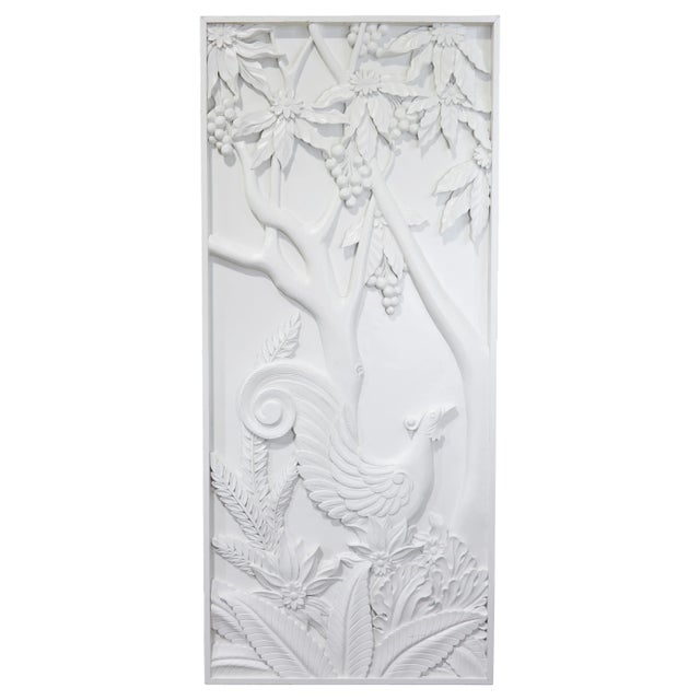 This striking pair of decorative wall panels features deep, sculptural white relief carving in a long, rectangular format....