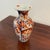 Late 1800s HandPainted Japanese Imari vase. Bulbous form with reeded body
