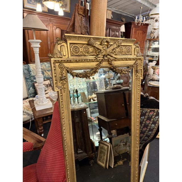 Louis XVI Style Mirror with Beveled Glass and Floral Decoration, in Very Good conditions. Designed before 1890
