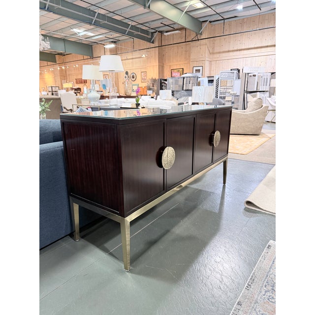 A sophisticated contemporary sideboard from Bernhardt’s acclaimed Jet Set collection. Finished in a deep caviar-toned...