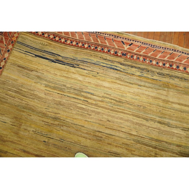 Quirky room Size Turkish rug with a primitive open field striated design derived from what looks to be an antique Persian...