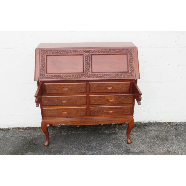 This Secretary Desk is made out of wood, solid wood, we believe it is rosewood. This Secretary Desk has a Asian Oriental...