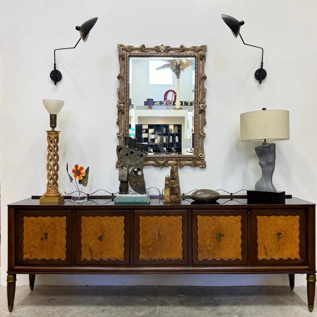 Vintage Italian Neoclassical Style Carved Wood Beveled Mirror Offered for sale is an ornate deeply carved vintage gilt...