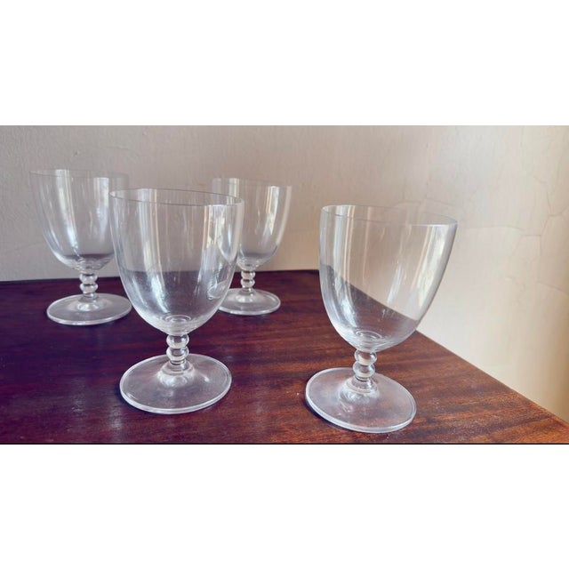 This is a vintage Mid-Century Modern lead crystal stemware set. The glasses feature thin, delicate rims, clear, brilliant...