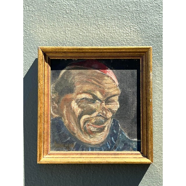 This compelling vintage oil portrait is an evocative character study, capturing the rugged features of a man in a vibrant...