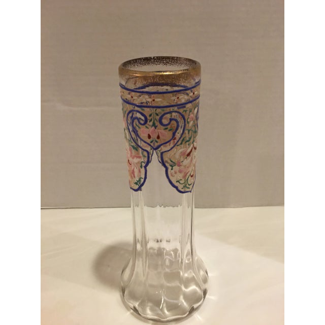 Elegant antique Moser enameled vase in cornflower blue, pink, green , white and burgundy. Gold rim. Measures 12” tall....