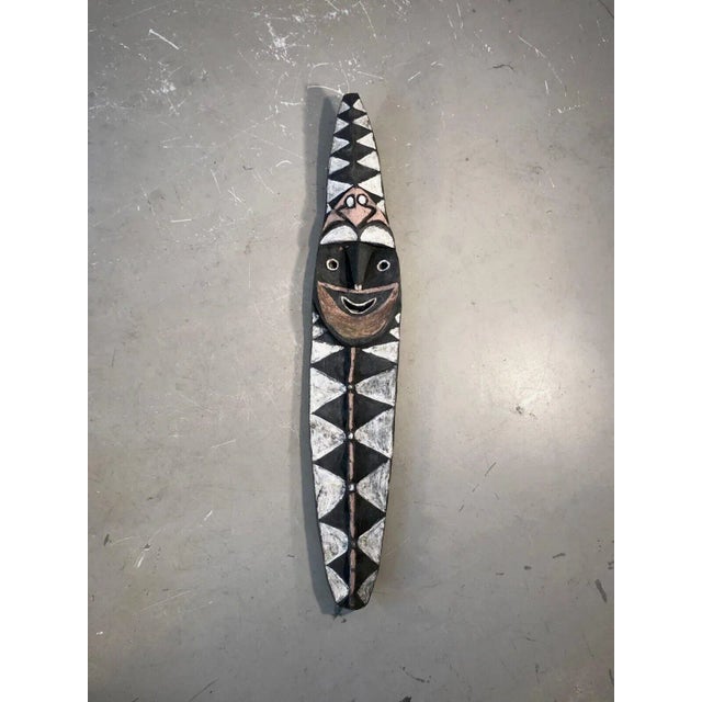 An old and authentic votive board representing the spirit of water, shamanic, primitive arts, tribal art, brutalist,...