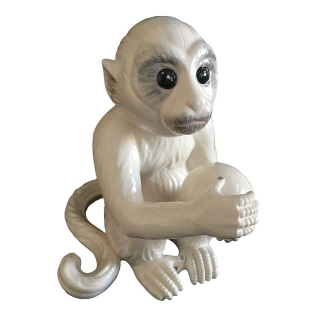 This white Capuchin ceramic/porcelain monkey is especially notable because one similar to it is prominently displayed in...