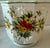 Vintage 1960s ceramic octagonal planter with raised relief and hand painted vibrant orange and yellow flowers and bright...