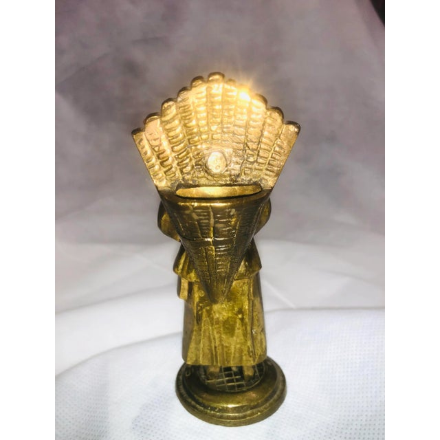 Rare to find this brass figure of a Dutch girl with gathering basket by Belgique, dated 1945.