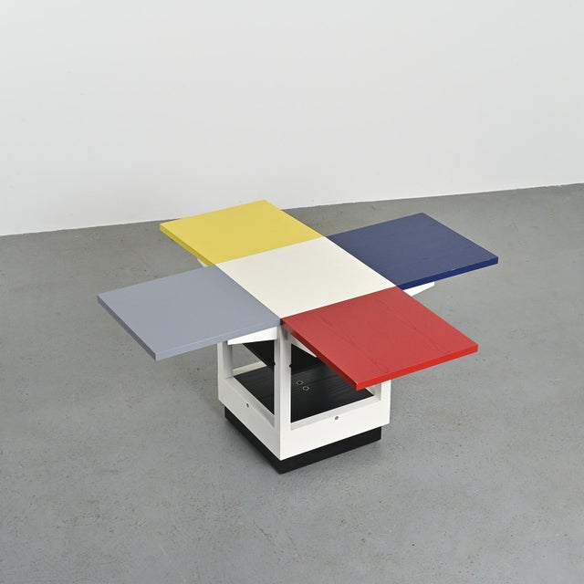 Model k10 n coffee table produced by tecta, germany. the cubic structure in white lacquered wood accommodates four...