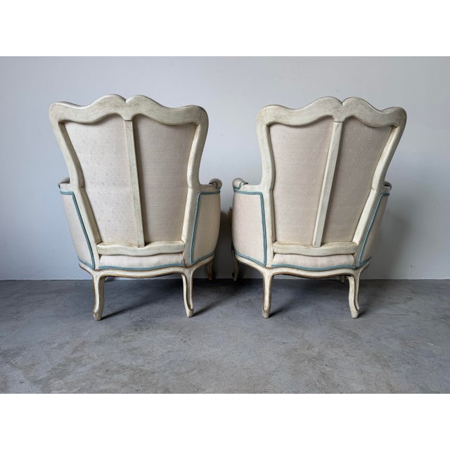 Textile Pair of Vintage Hollywood Regency French Louis XV-Style Painted & Gilt Bergère Lounge Armchairs For Sale - Image 7 of 12