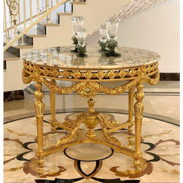 Fall in love with the elegance of this stunning Rococo style marble top dining table, a refined piece designed to bring...