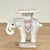 Amusing vintage Italian elephant drinks stand crafted in terra cotta, hand decorated in soft alluring colors and glazed.