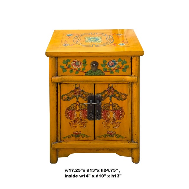 This is an oriental style end table nightstand painted with the rustic distressed mango yellow surface color. A simple...