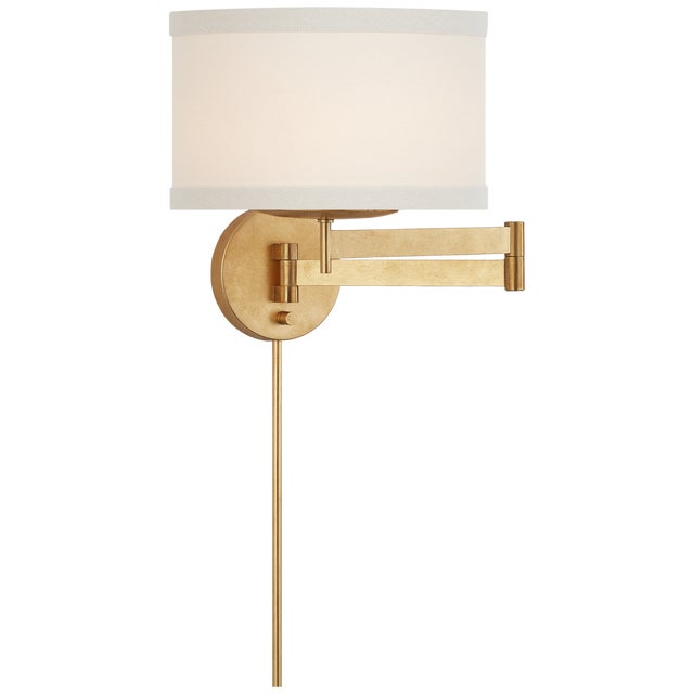 Walker Swing Arm Sconce in Gild with Cream Linen Shade Designer: kate spade new york Height: 12" Extension: 16" - 24.75"...