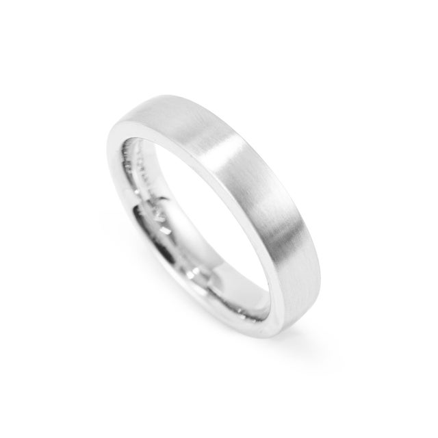 Brand: Tiffany & Co. Gender: Men's Metal Type: 950 Platinum Ring Size: 8.5 Width: 5.00 mm Weight: 13.44 grams Tiffany &...