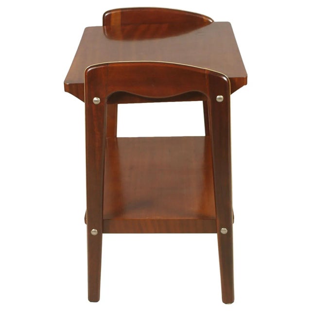 Italy mid-century modern occasional table, console, gio ponti attributed by consorzio mobili di cantù. In mahogany, wax-...