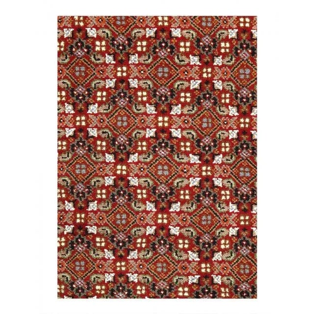 This Tabriz Persian Design Hand-Knotted Wool red Area Rug is handmade, hand-knotted. Lamb's wool on a cotton backing with...