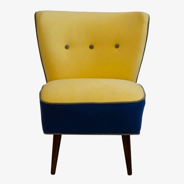 This petite slipper chair in the style of James Mont has multiple uses and is suitable as a cheerful accent chair in any...
