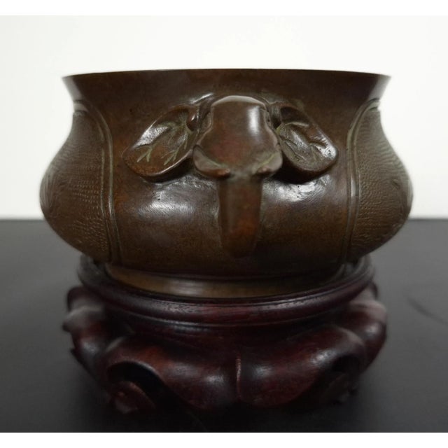 Chinese bronze elephant handles censer, a finely formed, circular, bronze bowl with the intact, original, rich bronze...