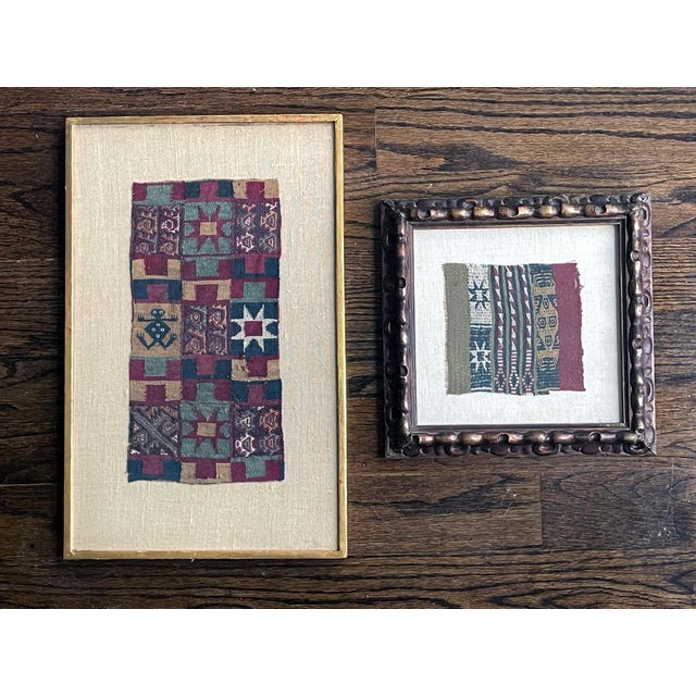 Two pre-Columbian textile fragments presented in wood frames. Handwoven in colored yarn, possibly camelid fibers, these...