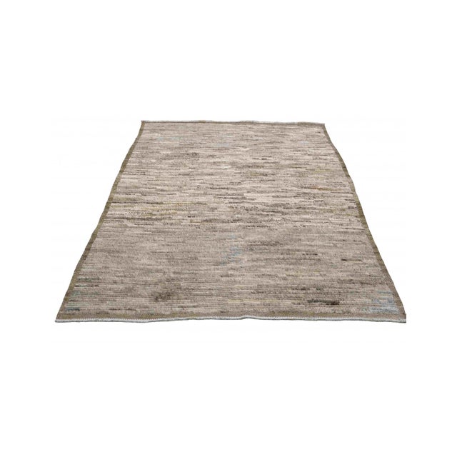 Hand knotted unique rug newly made in Afghanistan using hand spun wool.