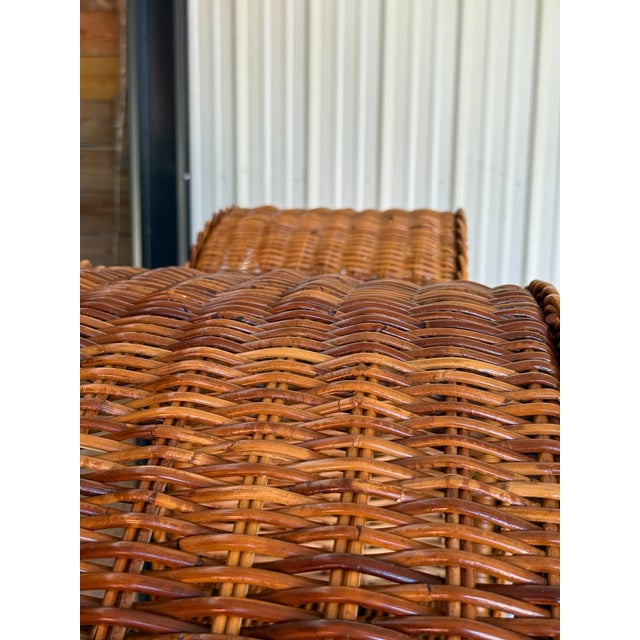 A striking pair of vintage Coastal rattan etagere bookshelves, restored and ready to stun in any space. These tall...