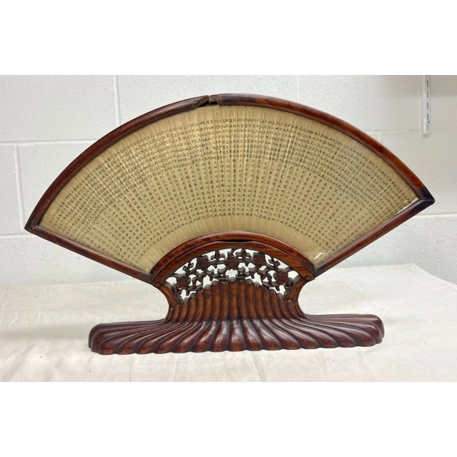 Up for sale is an antique Chinese hand fan from the early 19th century Qing Dynasty, featuring intricate hand-painted...
