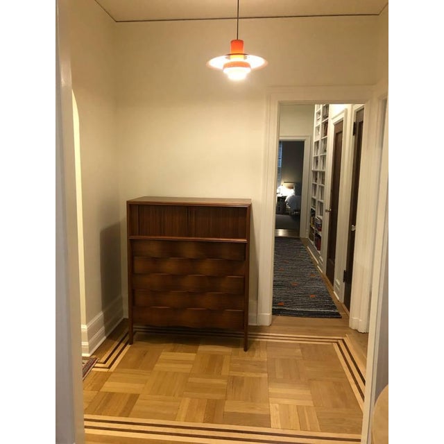 Mid-Century Tall Dresser – Edmond Spence (1950s, Sweden) Dark-stained maple dresser with 5 drawers featuring a sculpted...