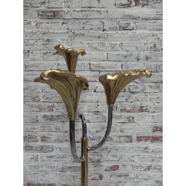 Height: 190 cm. Width: 45 cm Depth: 45 cm. The lamp is equipped with small lamp sockets (E14). The gold layer on the rod...
