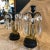 Pair of French Empire Circa 1840-1870 Black Metal on Black Marble Base with Gilt Ormolu Eagle and Crystal Luster Candle...