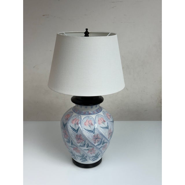 Design Plus Gallery presents a Chinoiserie Ceramic Table Lamp. It has a painted floral and foliate motif in pale blue and...